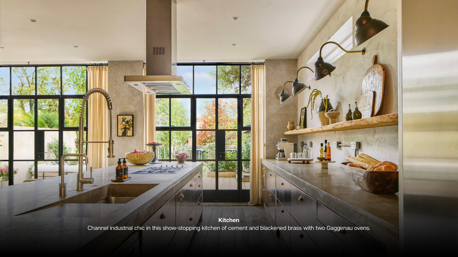 Living Room Make the most of cosy season in this living room where earth tones, velvet and wood creae warmth and spectacular windows frame garden views. Kitchen Island Take centre stage on a elect (2)