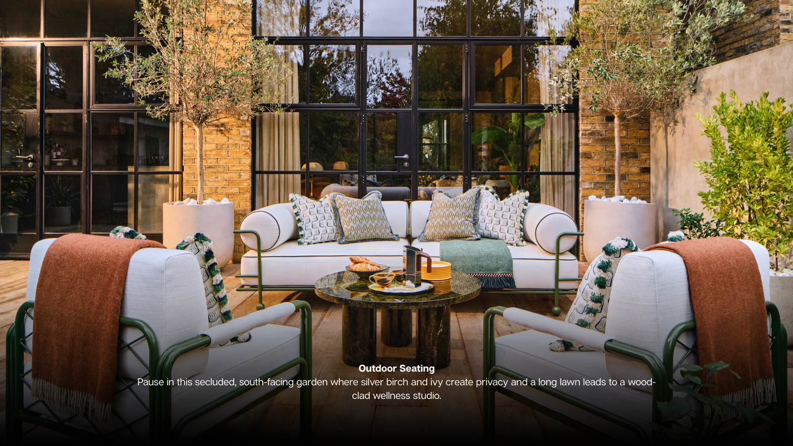 Living Room Make the most of cosy season in this living room where earth tones, velvet and wood creae warmth and spectacular windows frame garden views. Kitchen Island Take centre stage on a elect (8)